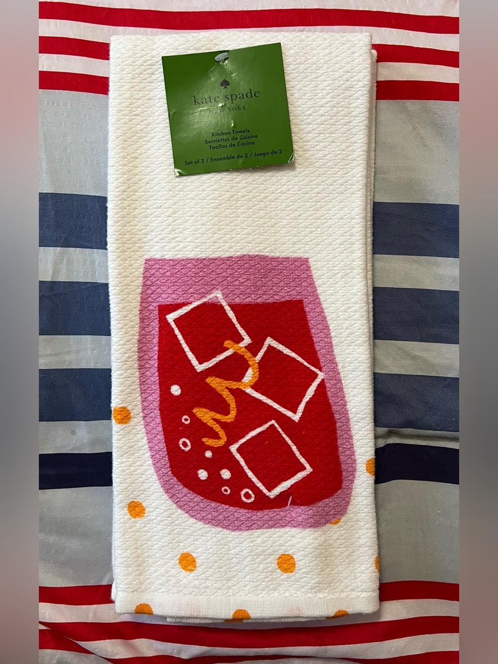 kate spade white towel with red and pink cocktail motif